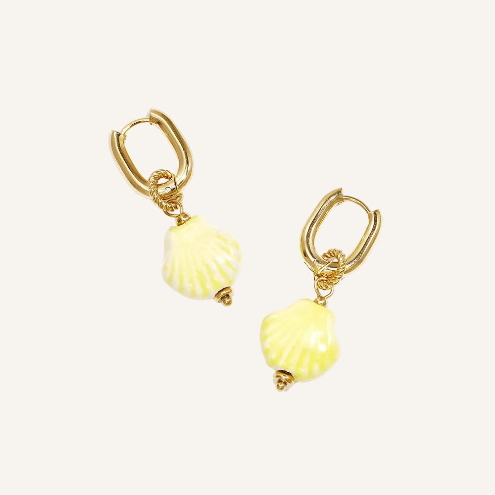 gold huggies with yellow shell charm