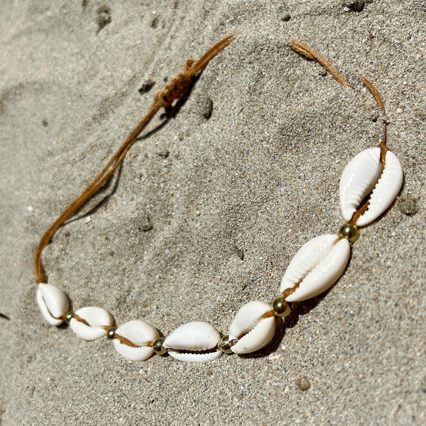 White Shells And Gold Beads