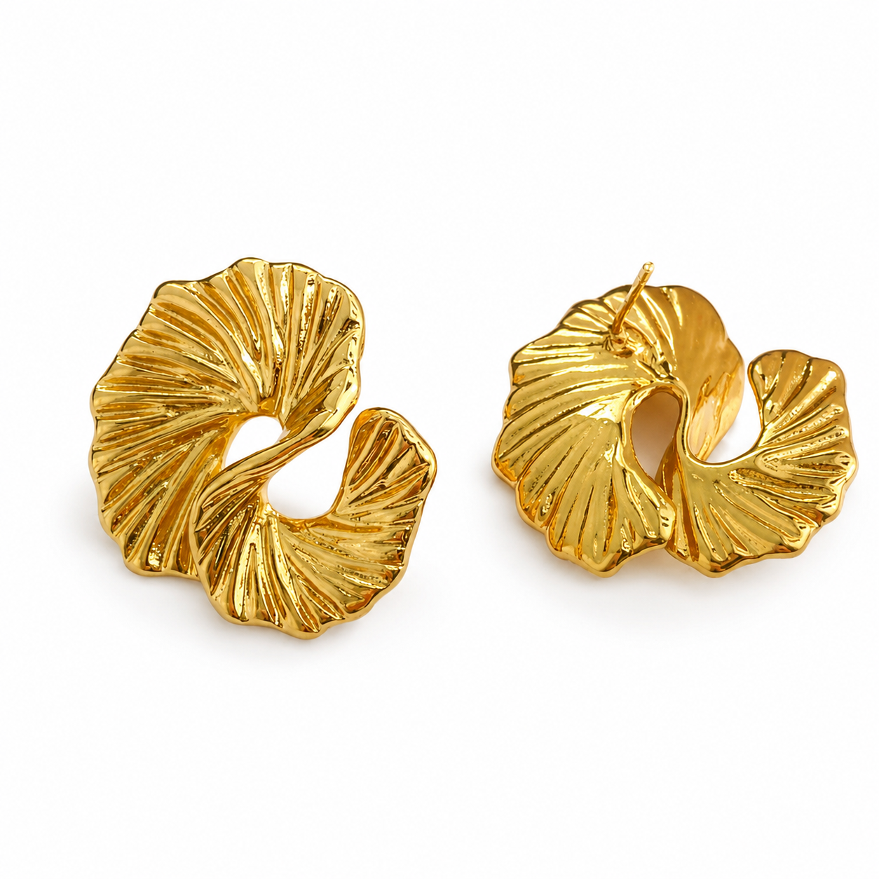 Gold sculptural statement earrings with textured folded fan design.