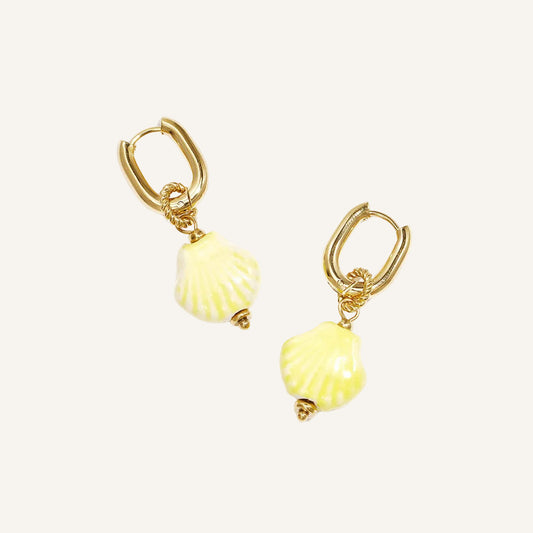 gold huggies with yellow shell charm