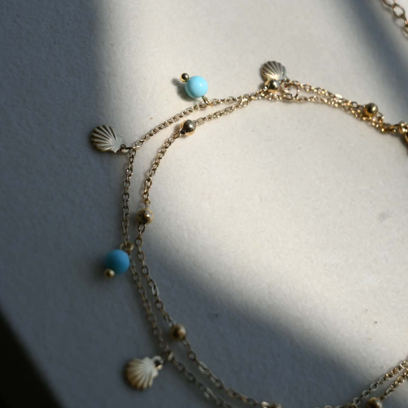 Blue Beads And Shell Charms