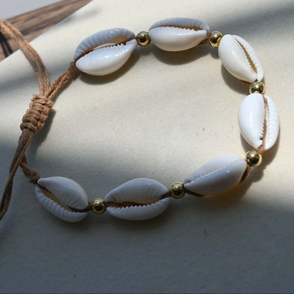 White Shells And Gold Beads