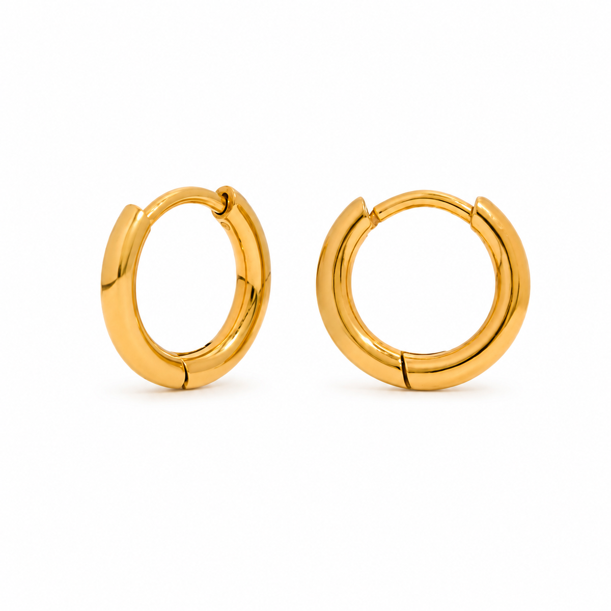 Small polished gold huggie hoop earrings with a smooth rounded design