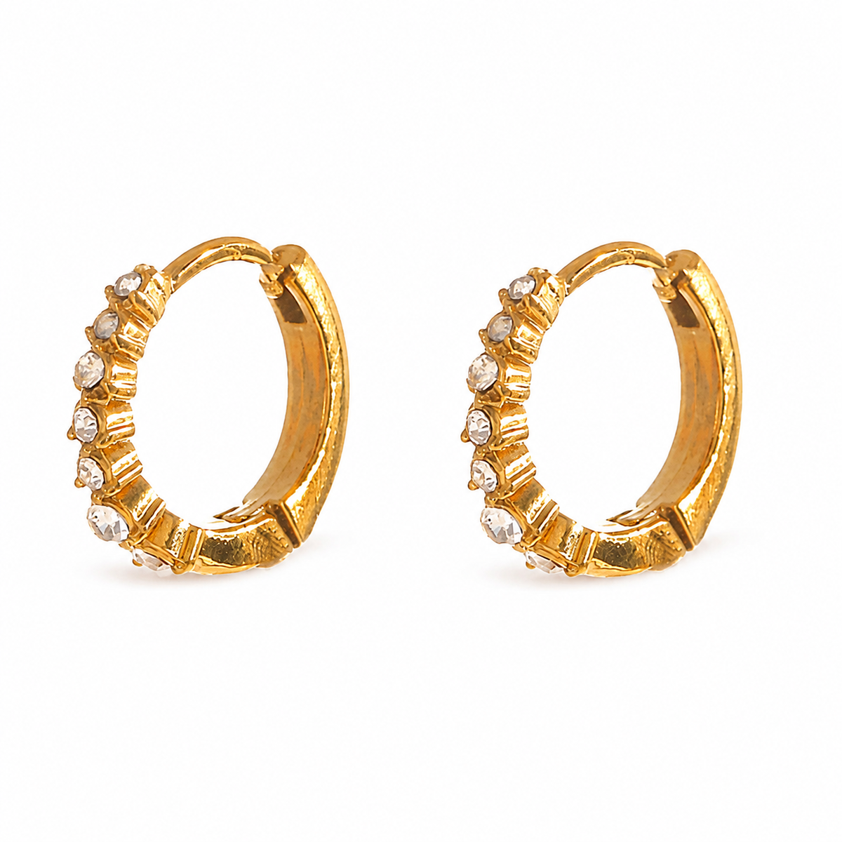 Petite gold huggie hoop earrings lined with delicate clear sparkling crystals.