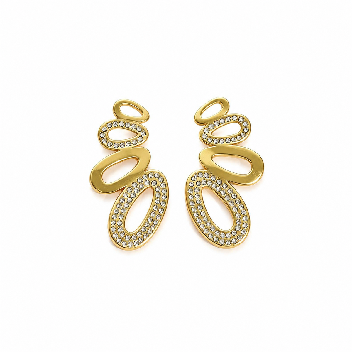 Gold statement drop earrings with organic oval shapes and clear sparkling stone details
