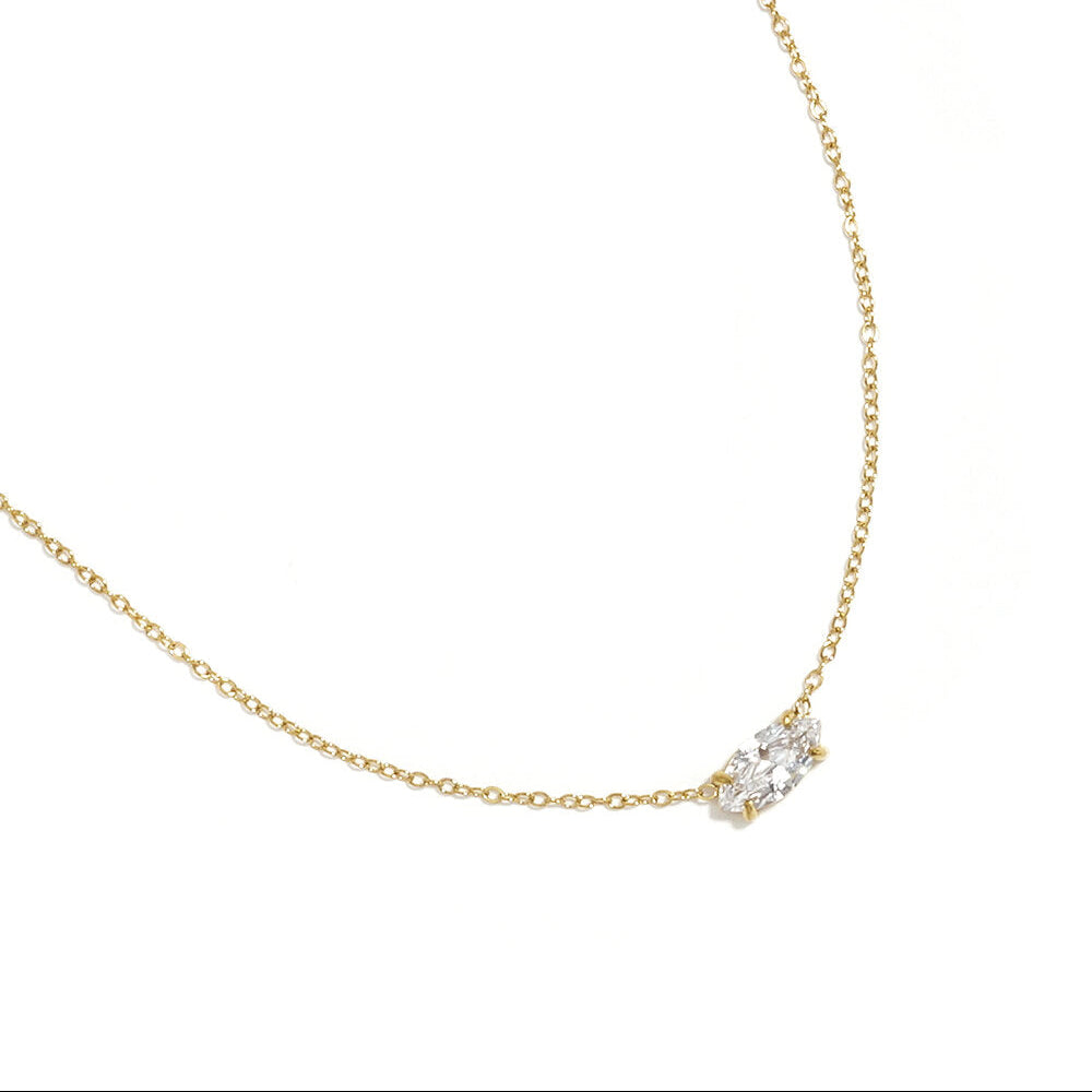 Fine gold chain necklace with a single marquise-cut clear stone