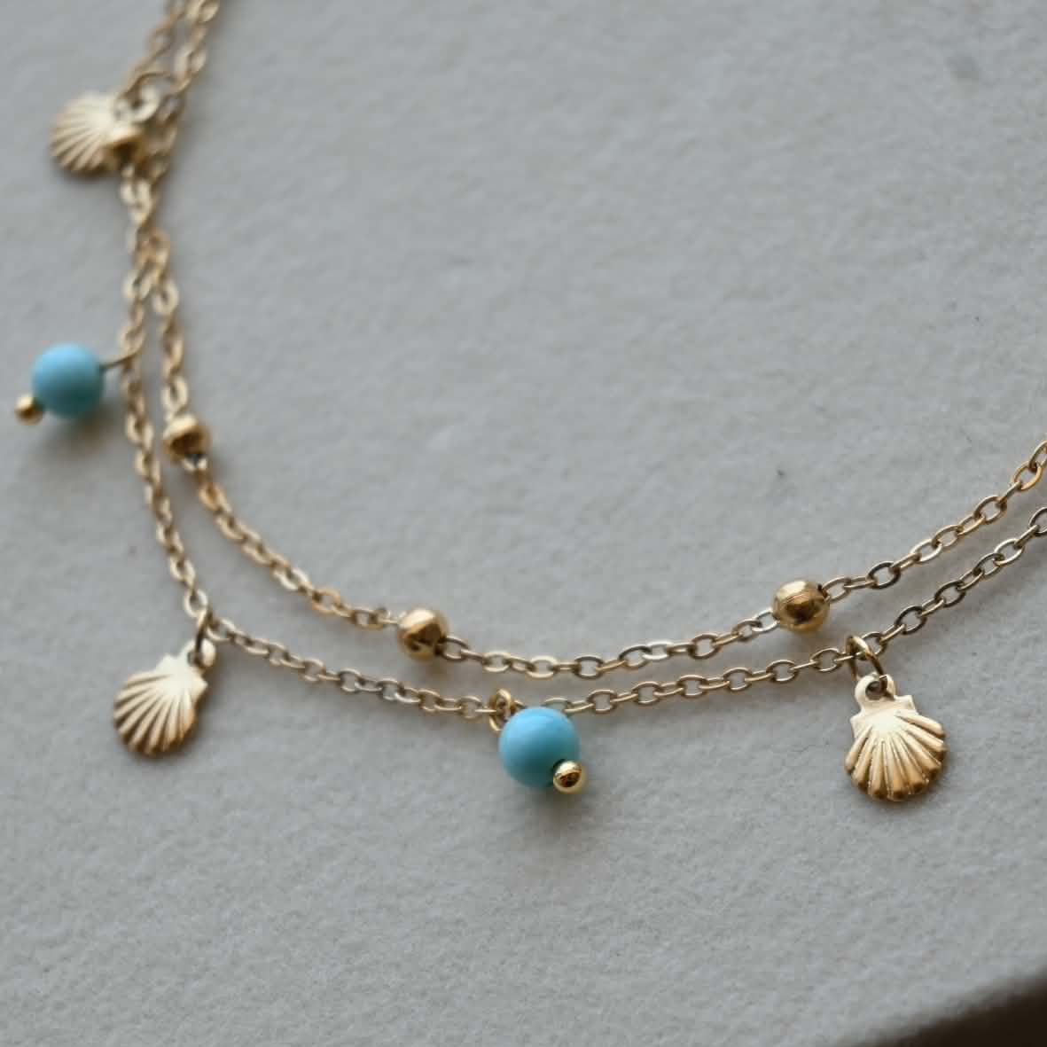Blue Beads And Shell Charms
