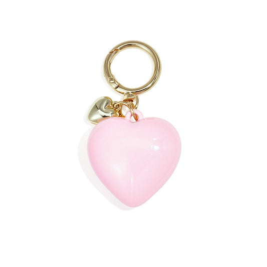 heart-shaped keychain with gold ring and clasp on white background